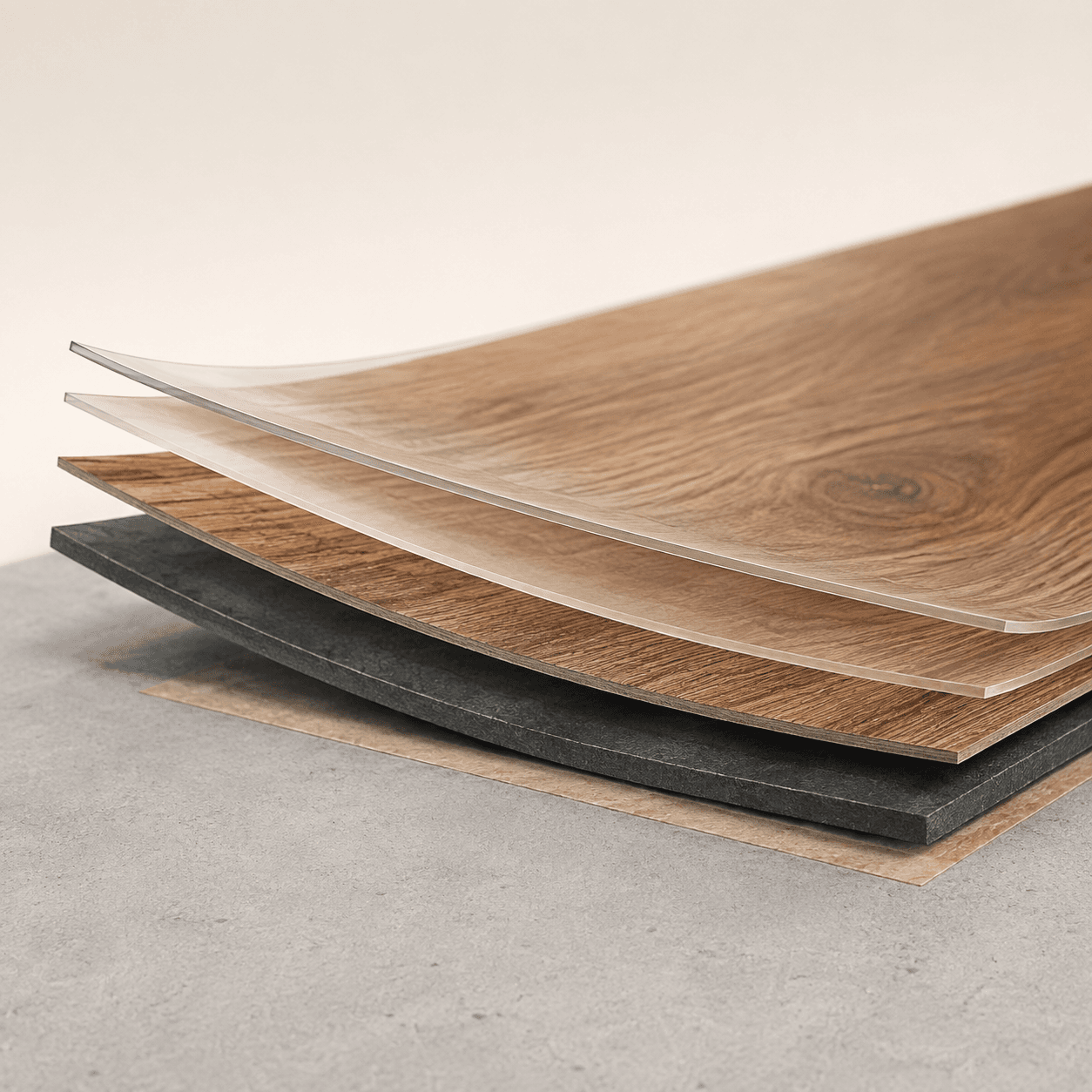 Realistic cutaway of flexible wood-look Luxury Vinyl with enlarged clear layers, a printed layer, a flexible vinyl base, and glue