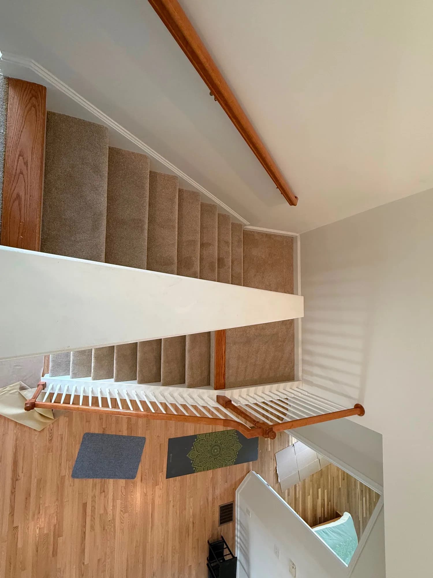 Carpet fitted over the treads of an interior staircase in Newington