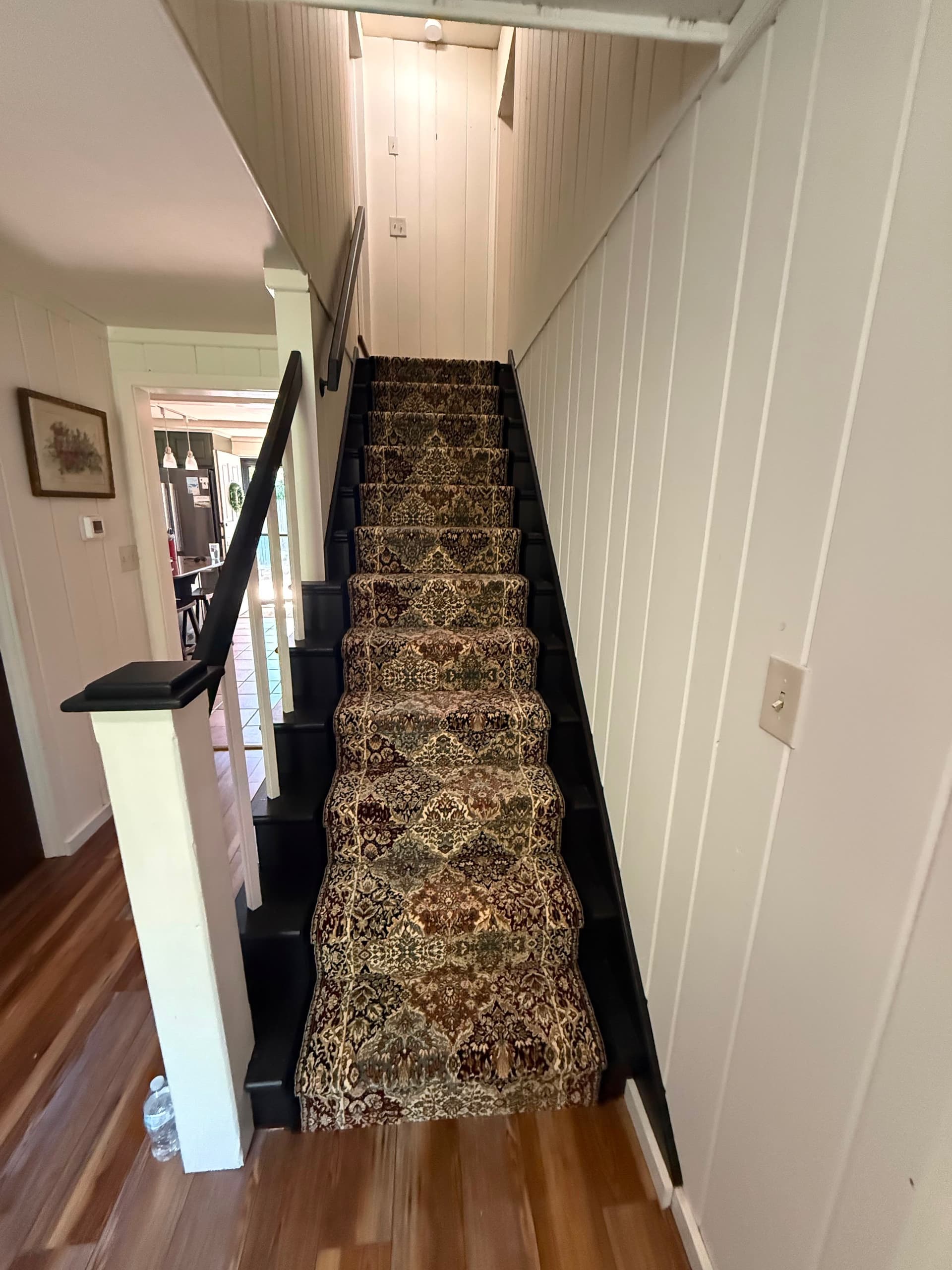 Dynamic Rugs Ancient Garden 57008-3233 patterned runner installed on a painted West Hartford staircase
