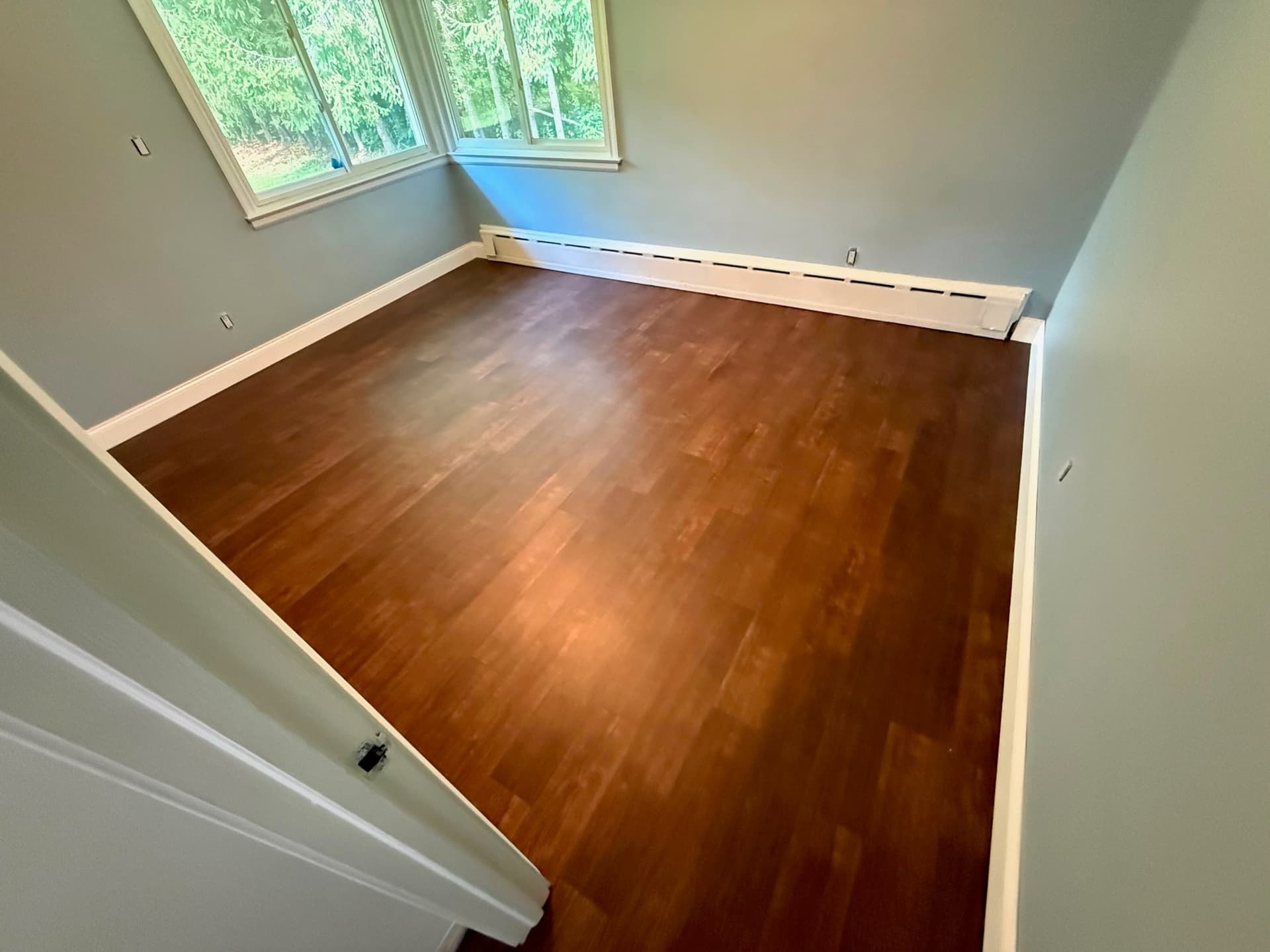Karndean Opus Rubra gluedown luxury vinyl plank installed in a Berlin bedroom