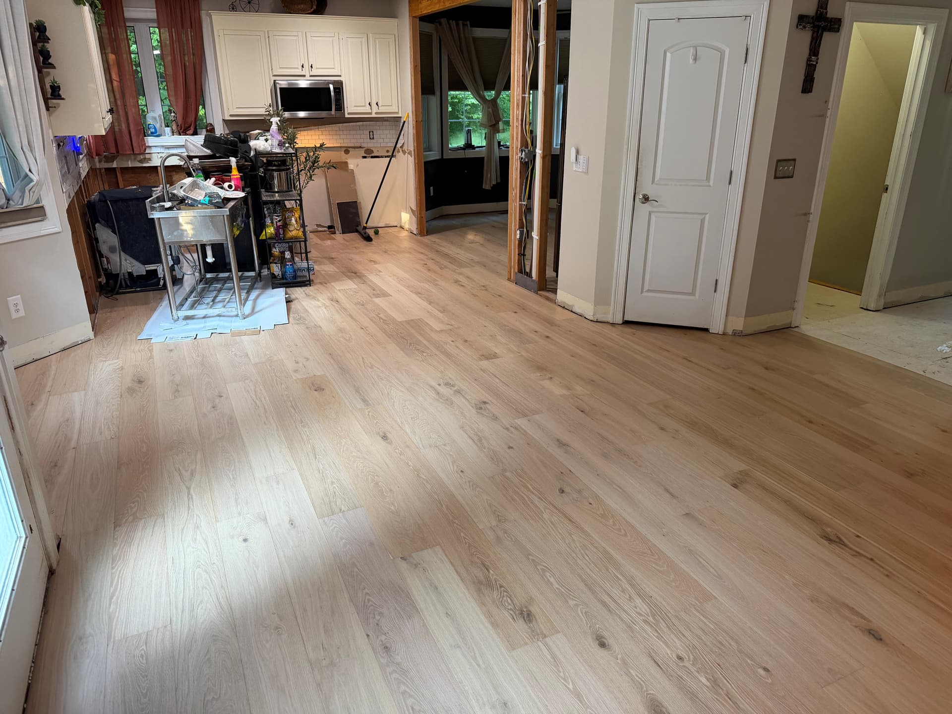 Skyline Plank Wheatfield Oak engineered hardwood installed across the main living areas of a Colchester home during renovation