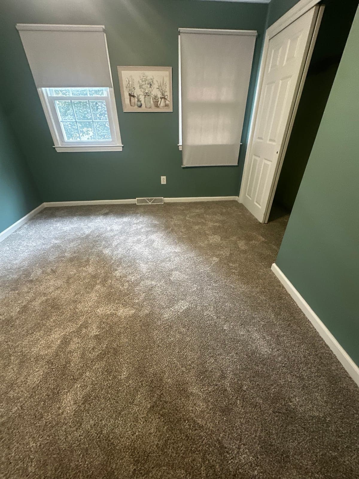 Engineered Floors Trendsetter II Sageview carpet installed in a Vernon guest bedroom