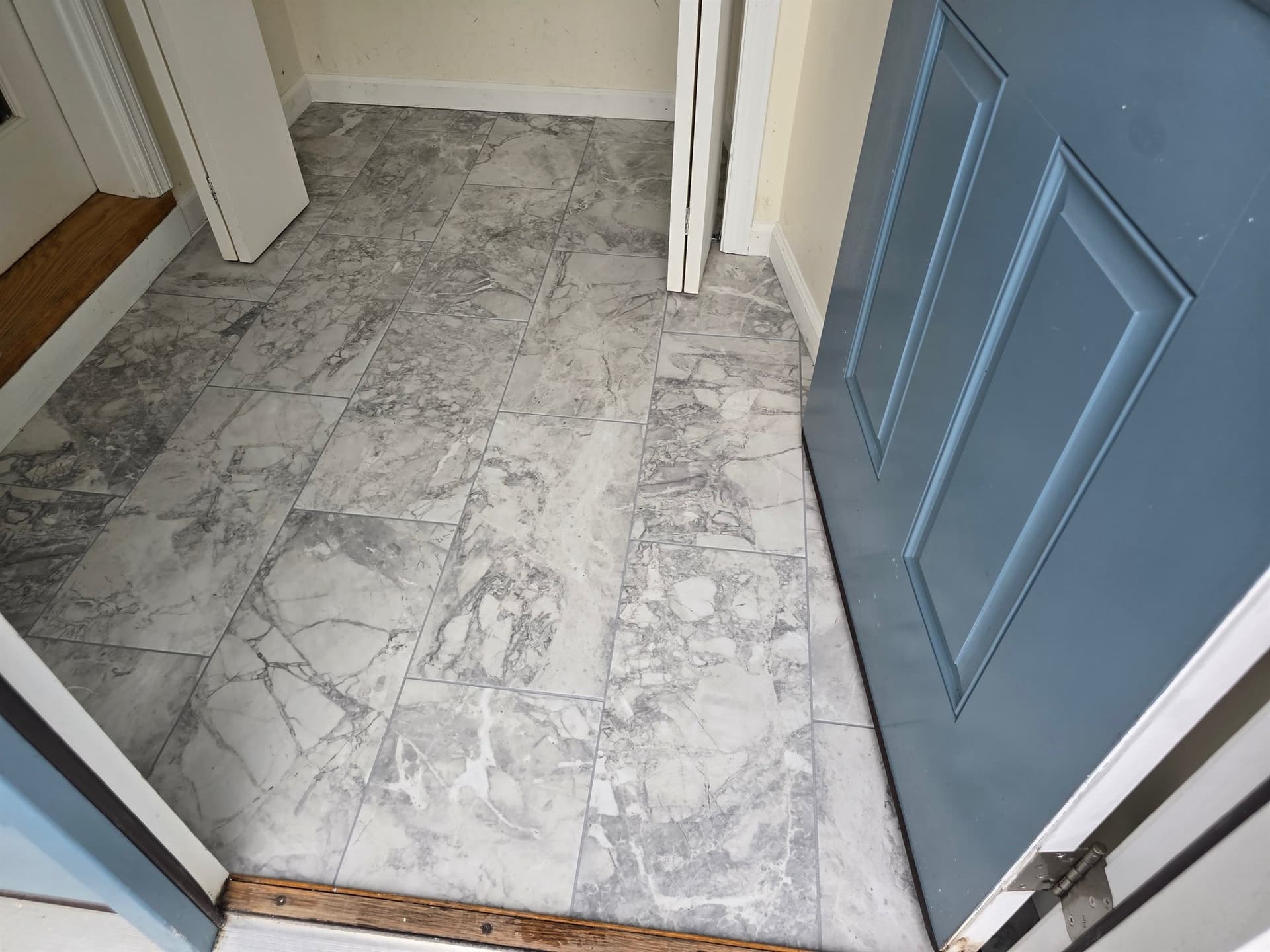 Matte gray porcelain tile installed in a West Hartford entryway