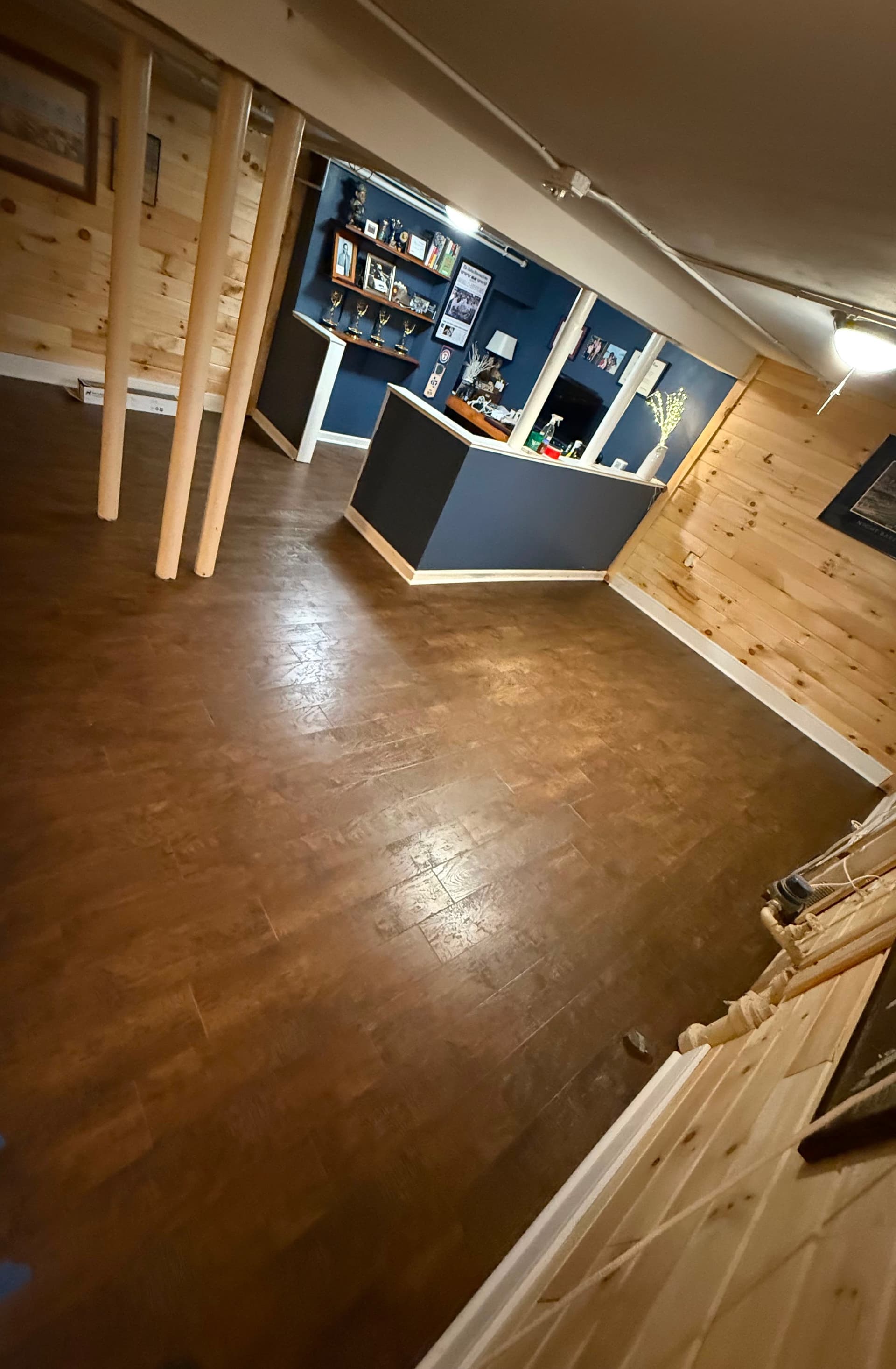 Karndean Hickory Nutmeg rigid flooring installed in a finished West Hartford basement