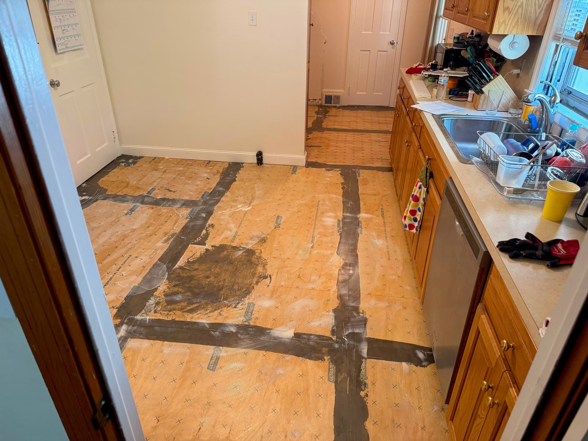 Prepared kitchen surface before a Luxury Vinyl tile installation in West Hartford