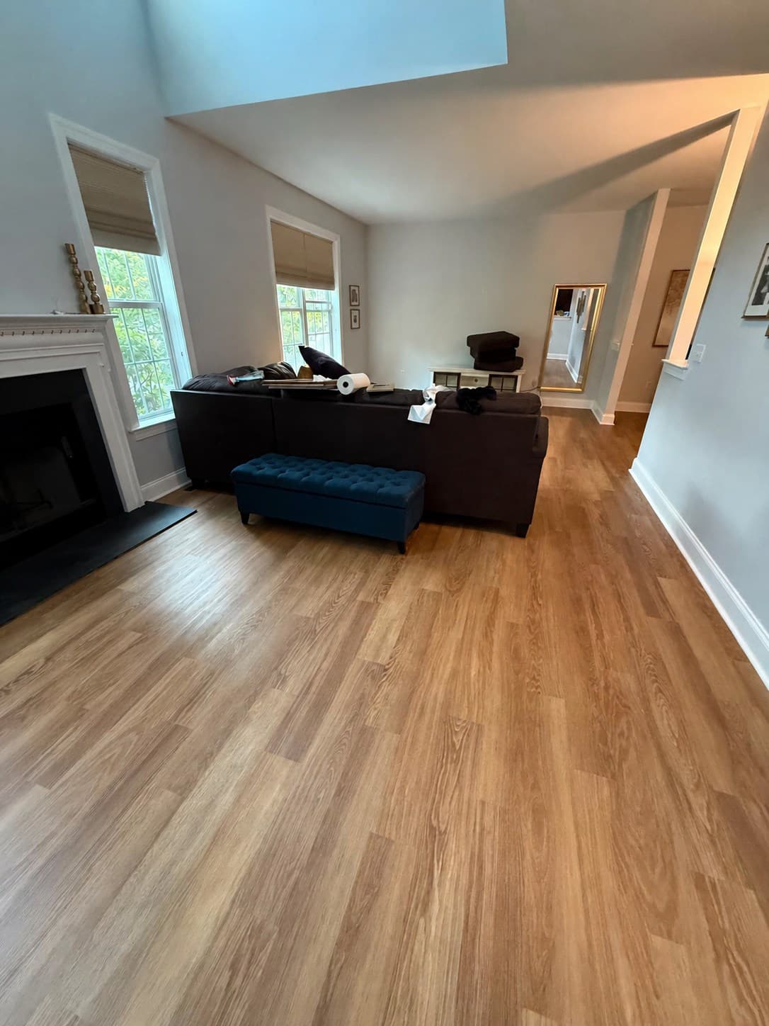 Karndean Honey Limed Oak click luxury vinyl flooring installed across a Windsor living room with a fireplace